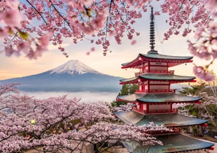 Mount Fuji with Chureito Pagoda and cherry blossoms at sunrise, one of the best places to visit in Japan.