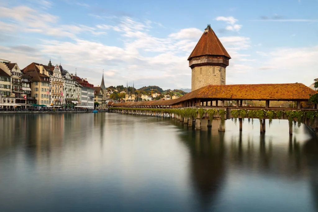 The wooden Chapel Bridge and water tower on the Reuss River in Lucerne, Switzerland.