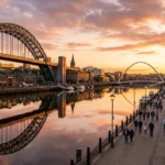 View of the Tyne Bridge and Quayside at sunset, a top spot for what to do in Newcastle
