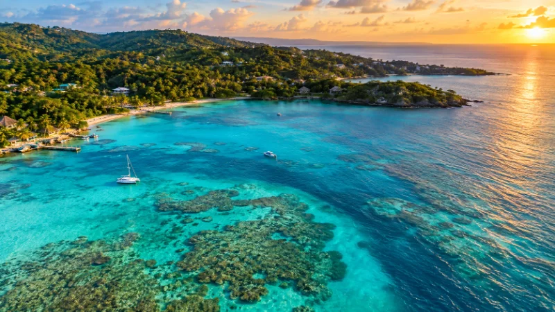 Turquoise water and coral reef along the coast of Roatan, one of the best things to do in Honduras