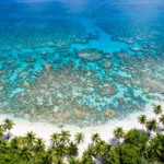 Aerial view of Roatán beach and coral reef, Bay Islands, Honduras.